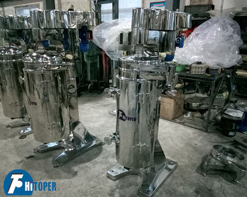 Centrifughe tubolari industriali per la separazione liquida di solidi liquidi e la lavorazione della sospensione con scarico basato su densità precisa